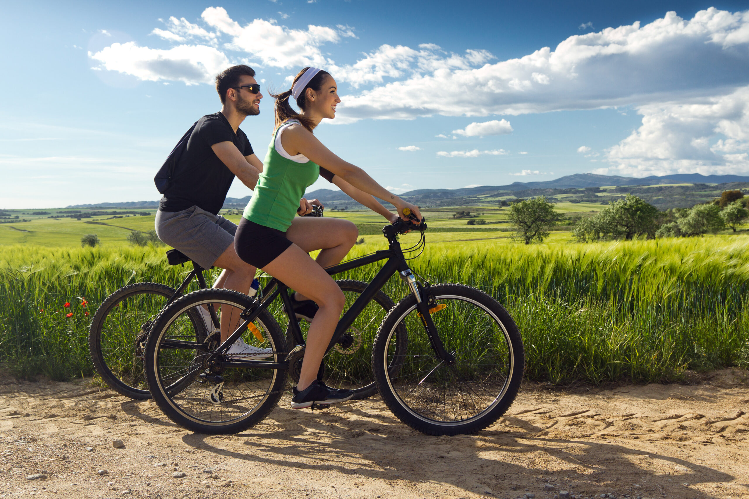 Couple Riding bikes together